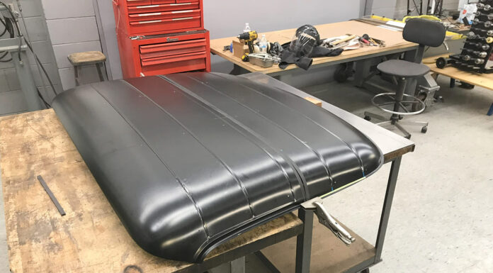 A 1956 Ford F100 Gets a Nomad-Style Roof ford f100 custom bead rolled roof panel on bench