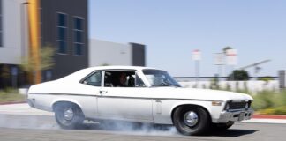 69 chevrolet nova brake test side view tire smoke street driving action