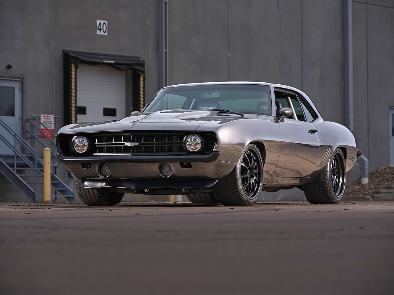 1969 Chevrolet Camaro custom front low angle black wheels LED headlights pro touring stance