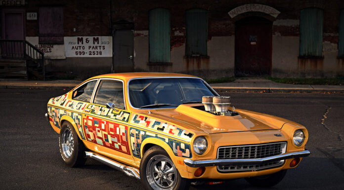 1971 Chevrolet Vega custom drag car front three quarter view yellow paint chrome wheels hood scoop