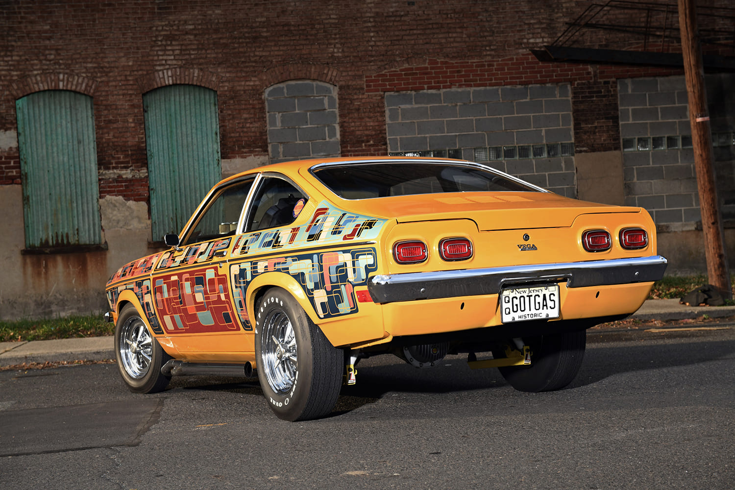 Chevrolet Vega custom drag car rear three quarter view chrome bumper dual exhaust vintage graphics