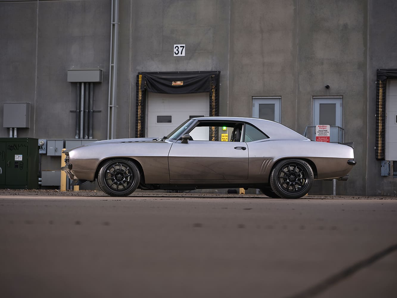 1969 camaro custom side profile lowered stance black wheels pro touring build clean body lines