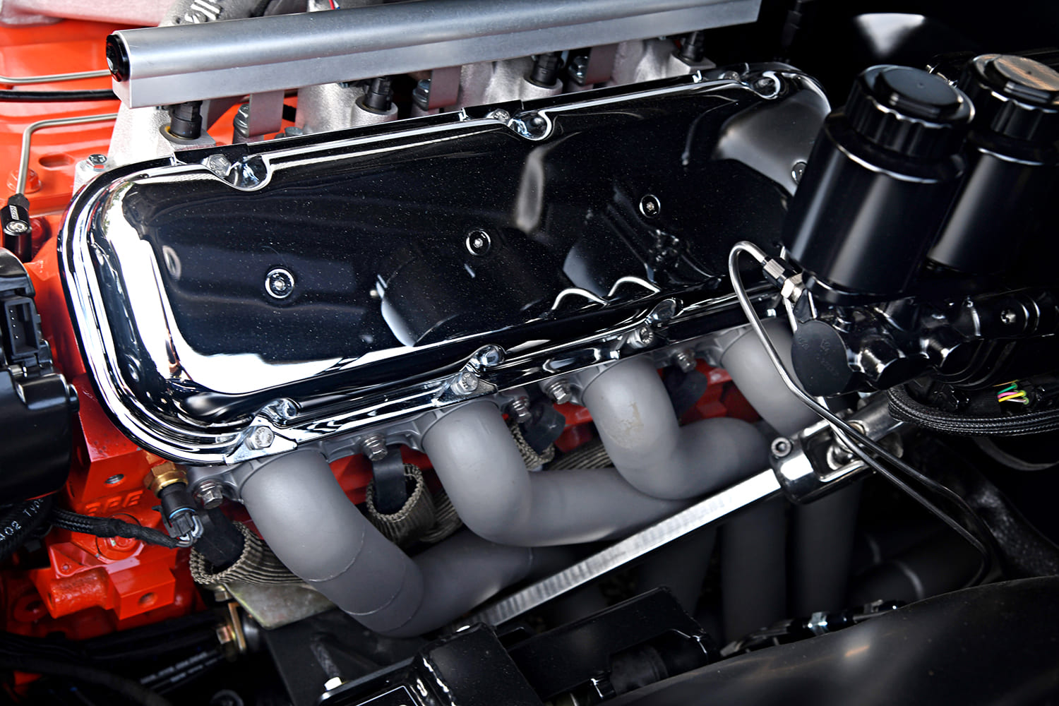 1970 Chevrolet Chevelle SS 396 blue pro touring engine close up headers valve cover detail