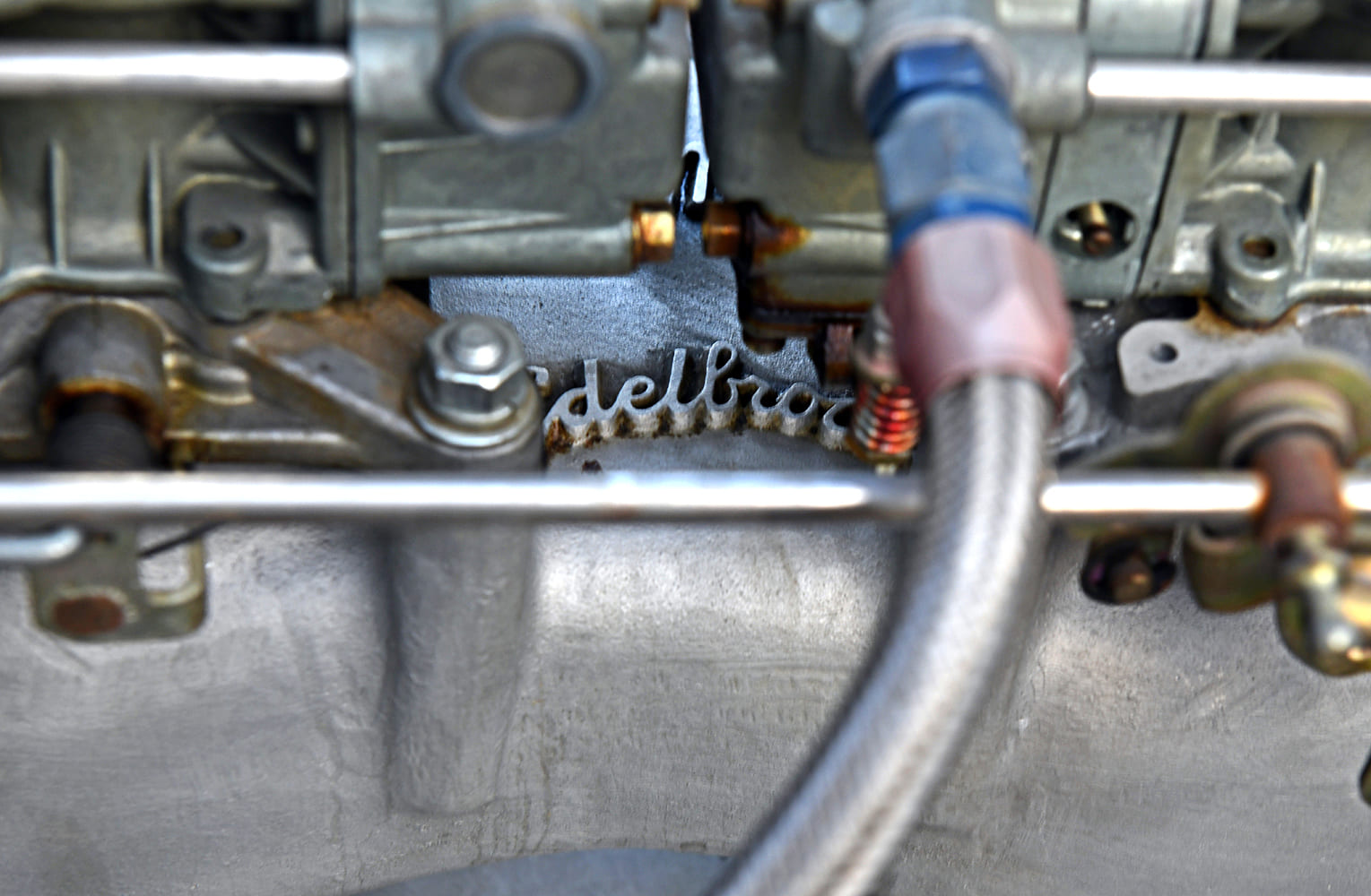 carburetor detail edelbrock intake close up fuel lines