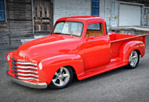 Dennis Schaffner’s Street Rod–Inspired 1947 Chevy 3100 47 Chevrolet 3100 custom red pickup truck front three quarter view chrome grille lowered street rod