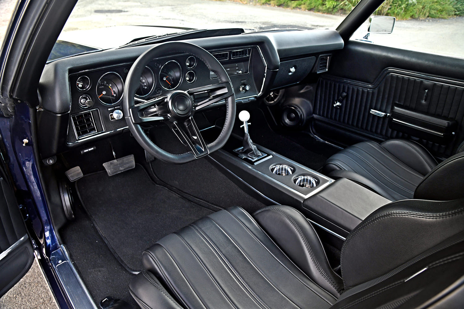 1970 Chevrolet Chevelle SS 396 custom interior black leather bucket seats center console manual shifter