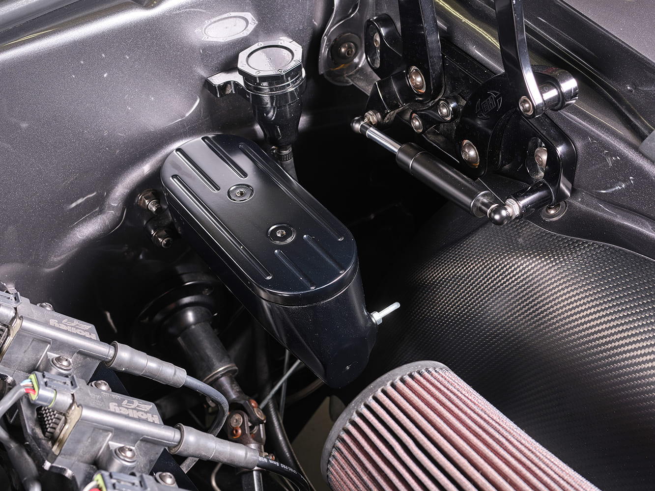 1969 Chevrolet Camaro custom engine bay billet reservoir linkage carbon fiber inner fender detail