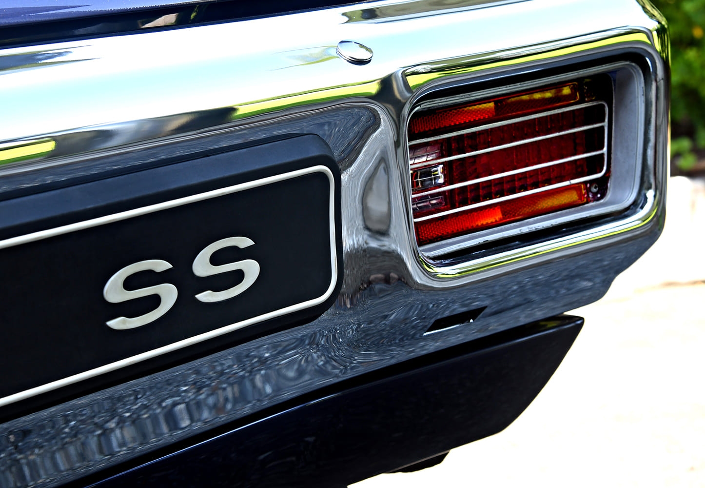 1970 Chevrolet Chevelle SS 396 rear tail light chrome trim SS badge close up detail