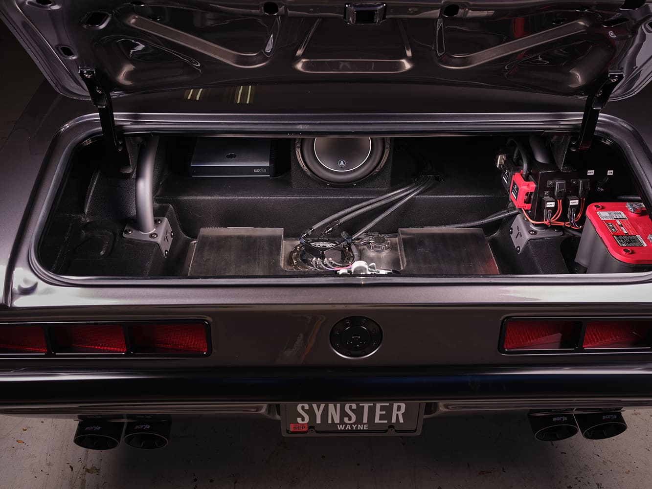 1969 Chevrolet Camaro custom trunk setup fuel cell battery audio subwoofer clean pro touring installation