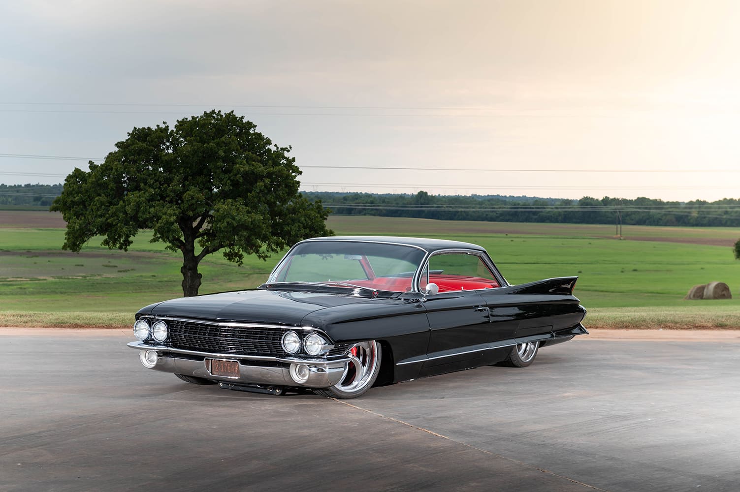 coupe deville front three quarter view quad headlights lowered stance