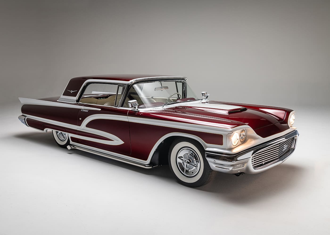 1960 ford thunderbird front three quarter view chrome grille headlights