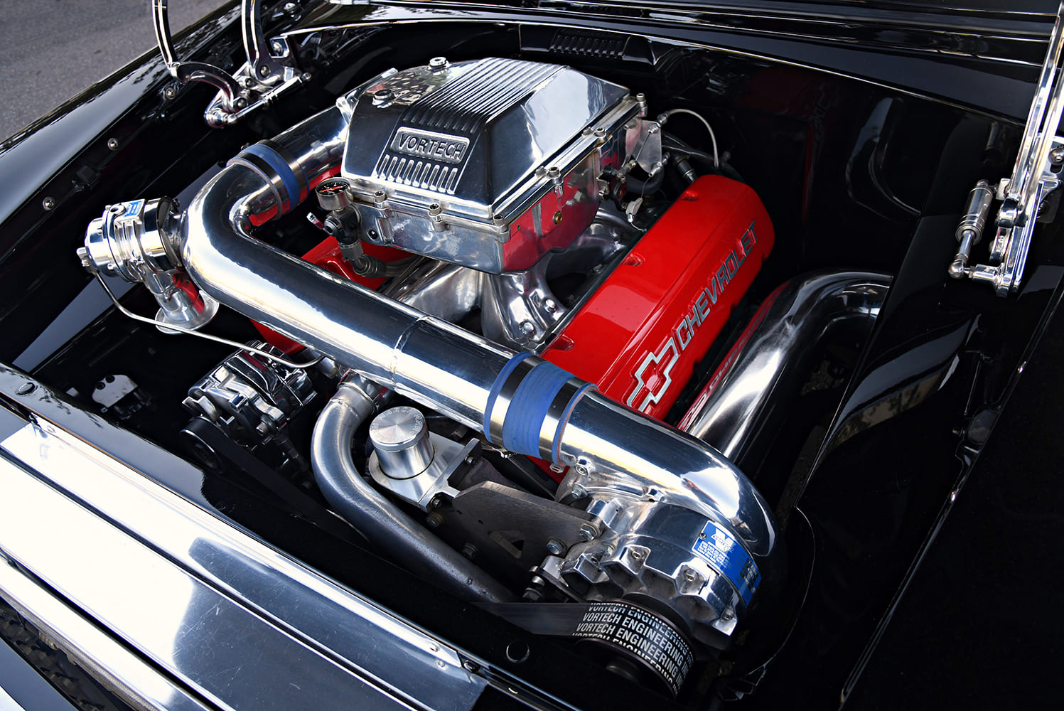 1955 Chevrolet Bel Air supercharged V8 engine Vortech system polished aluminum intake red Chevrolet valve covers