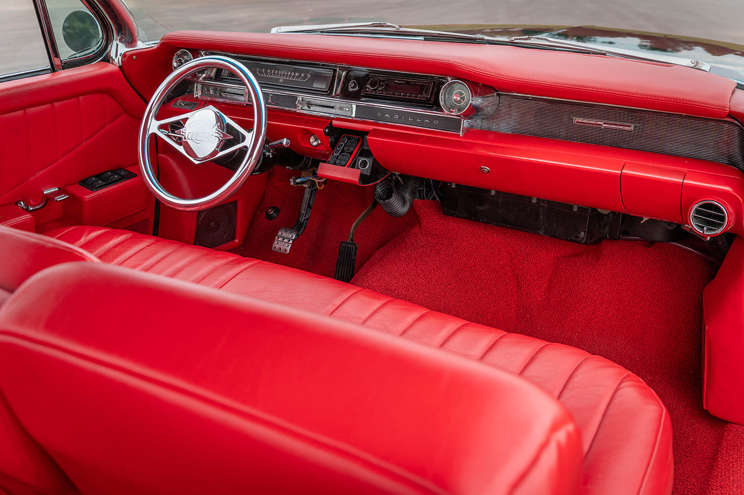 coupe de ville red interior dashboard steering wheel classic gauges vintage cabin detail