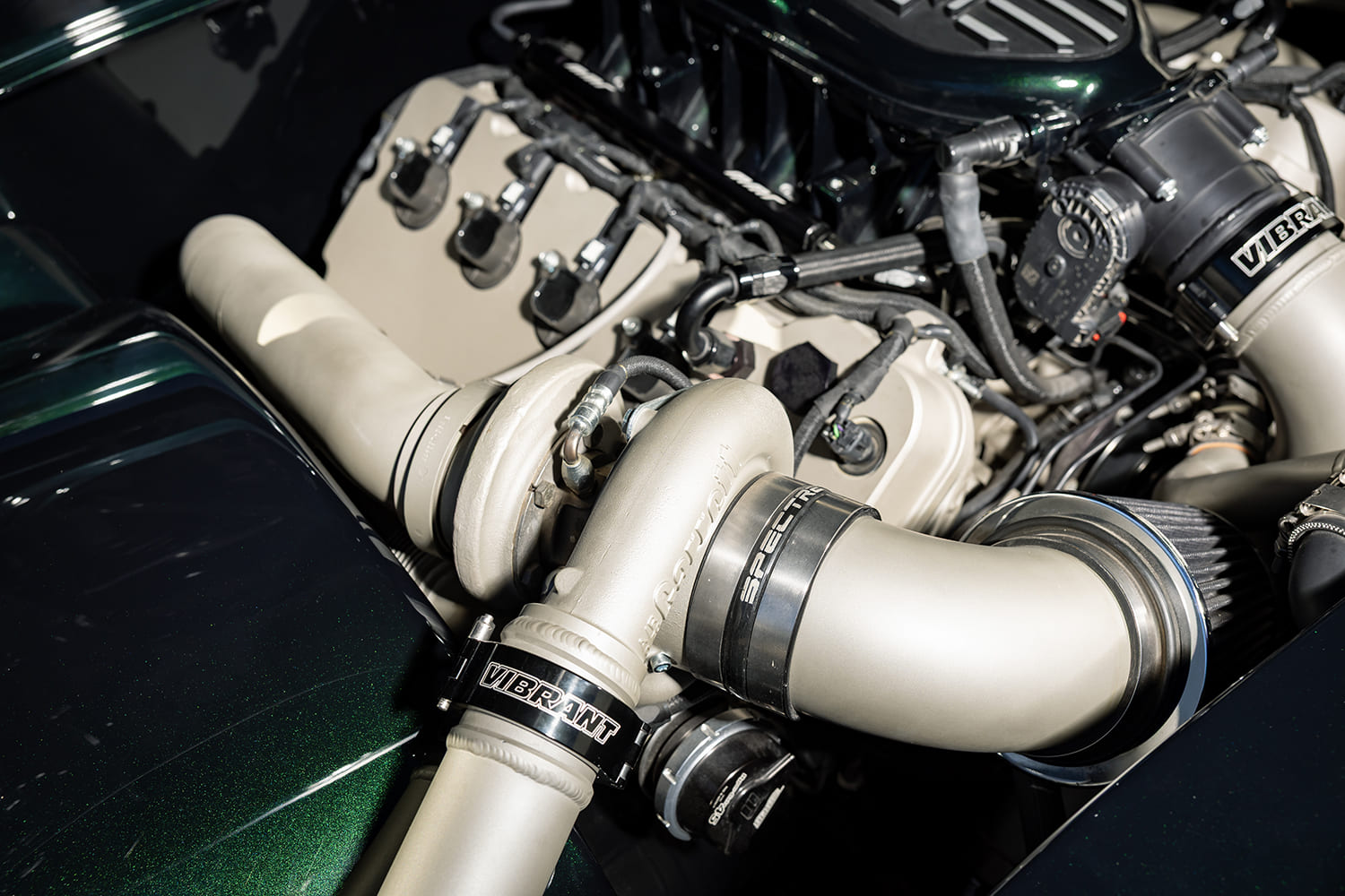 twin turbo Coyote V8 detail turbocharger compressor housing custom intake