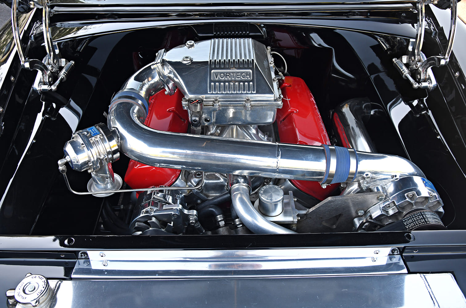 1955 Chevrolet Bel Air supercharged V8 engine bay custom restomod polished components performance build