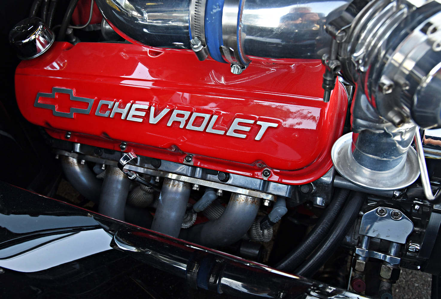 1955 Chevrolet Bel Air Chevrolet V8 red valve cover headers custom supercharged engine detail