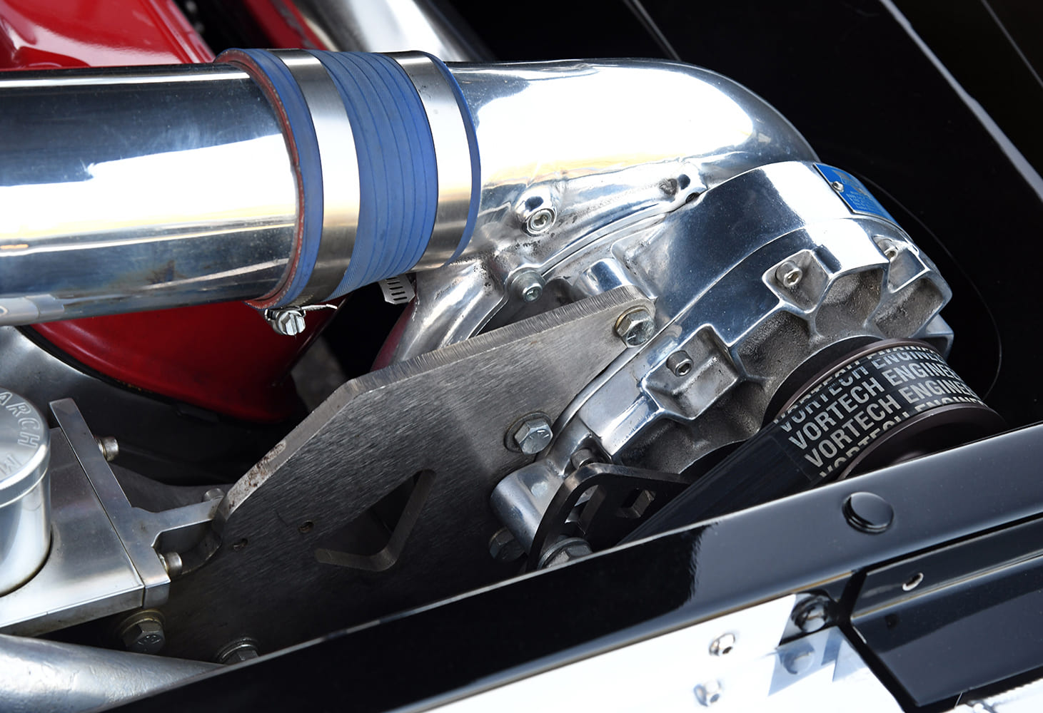 1955 Chevrolet Bel Air Vortech supercharger detail polished intake tubing custom forced induction V8 engine bay