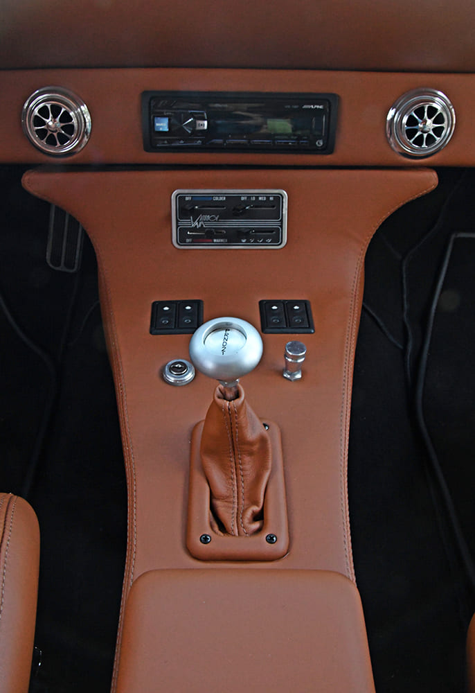 1955 Chevrolet Bel Air custom center console shifter switches modern restomod interior detail