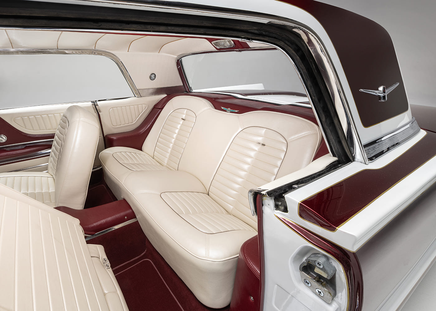 1960 ford thunderbird rear seats custom upholstery red white leather emblem detail classic cruiser