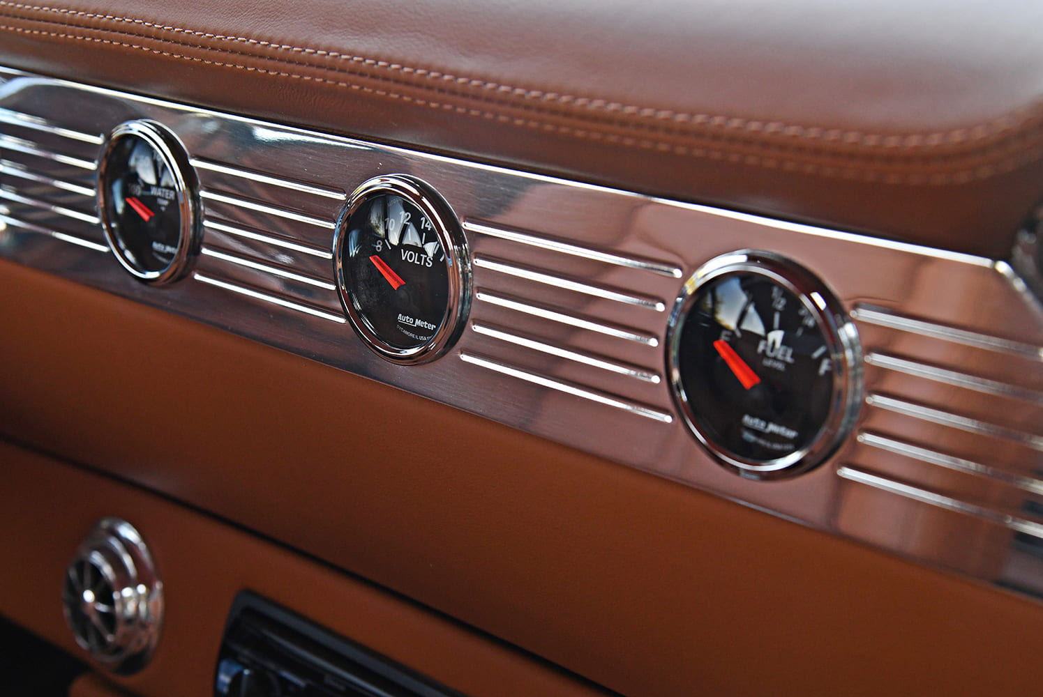 1955 Chevrolet Bel Air AutoMeter auxiliary gauges volt fuel water temperature dash detail