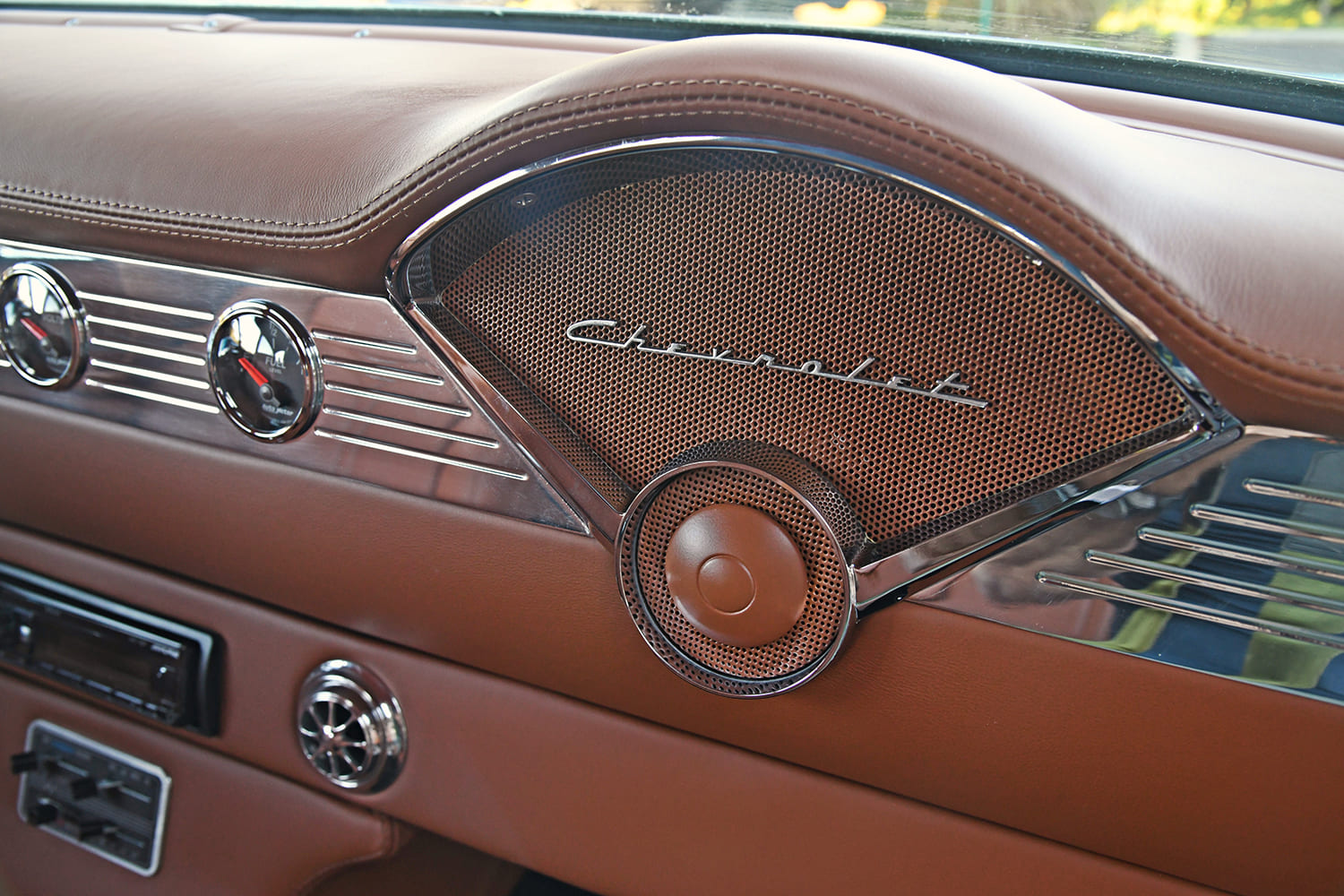1955 Chevrolet Bel Air custom dashboard speaker grille Chevrolet script restomod interior detail
