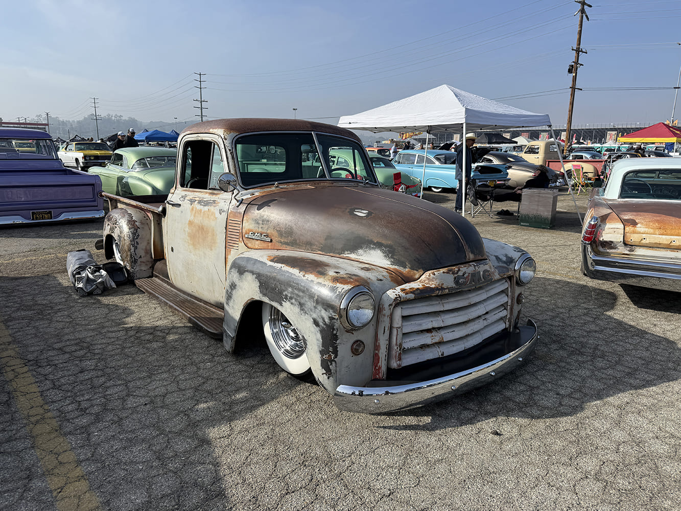 1951 GMC 100 patina lowered pickup truck rat rod style whitewall tires classic car show display