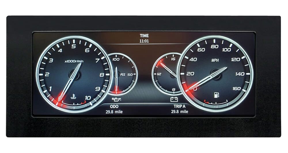 AutoMeter InVision digital gauge cluster featuring a speedometer, tachometer, oil pressure, coolant temperature, fuel level, and voltage readouts.