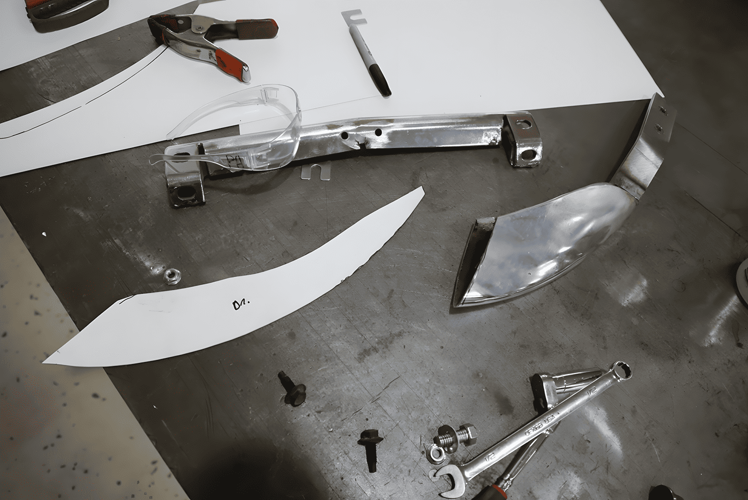 1965 Corvette custom bumper bracket fabrication metal template pattern workbench layout