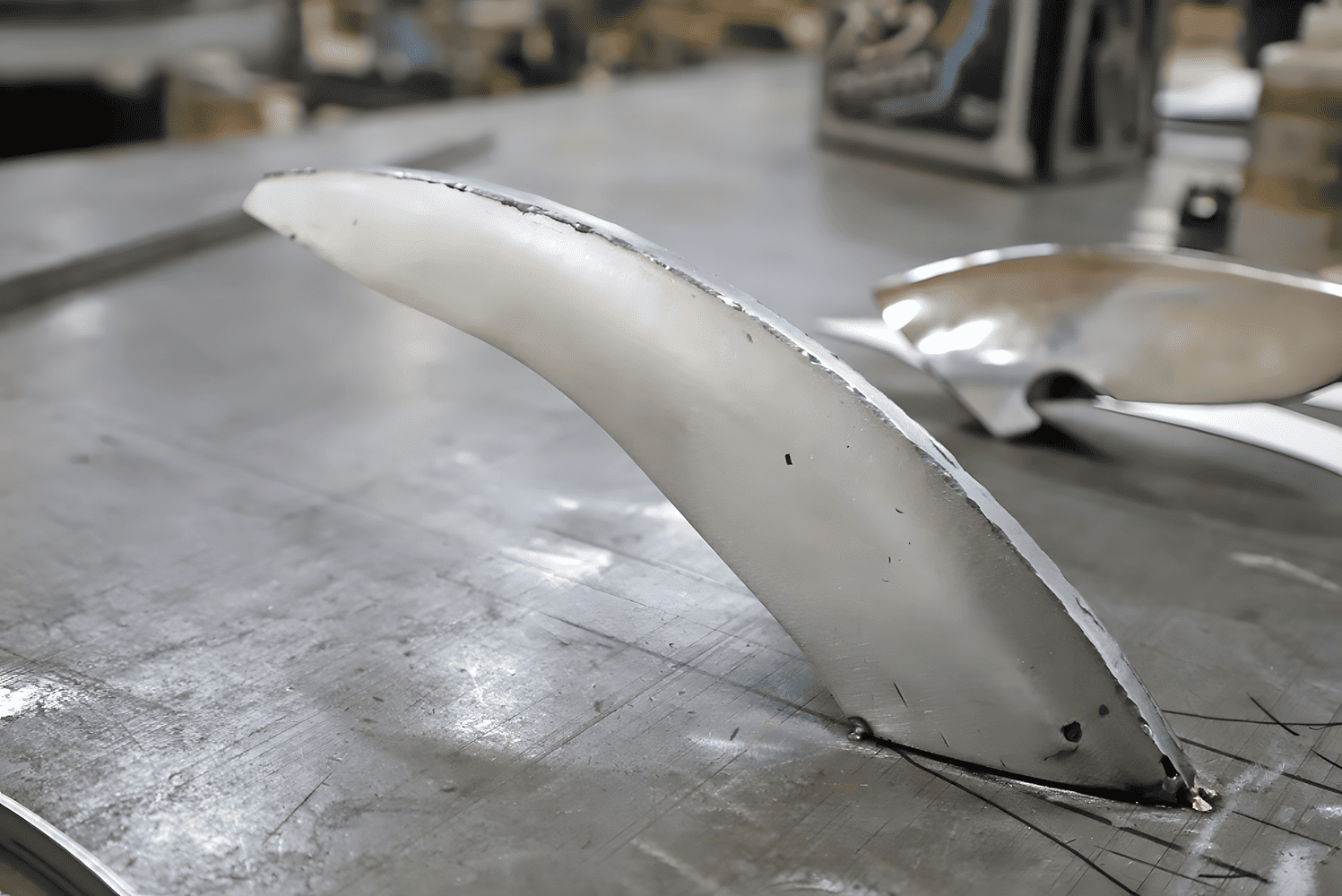 1965 Corvette custom bumper blade fabrication welded steel extension raw metal finish