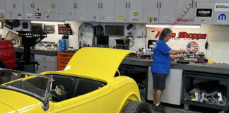 yellow hot rod inside stereo shop system installation