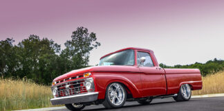1966 Ford F100 custom red lowered pickup front angle chrome wheels street truck