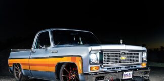 C10 squarebody lowered pickup orange stripe pro touring wheels front three quarter view