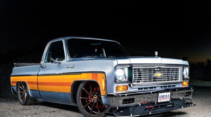 C10 squarebody lowered pickup orange stripe pro touring wheels front three quarter view