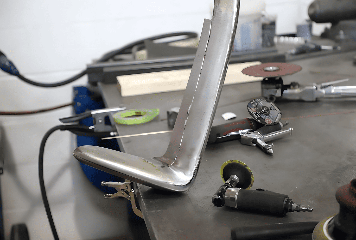 corvette custom bumpe fabrication TIG welded corner section on workbench
