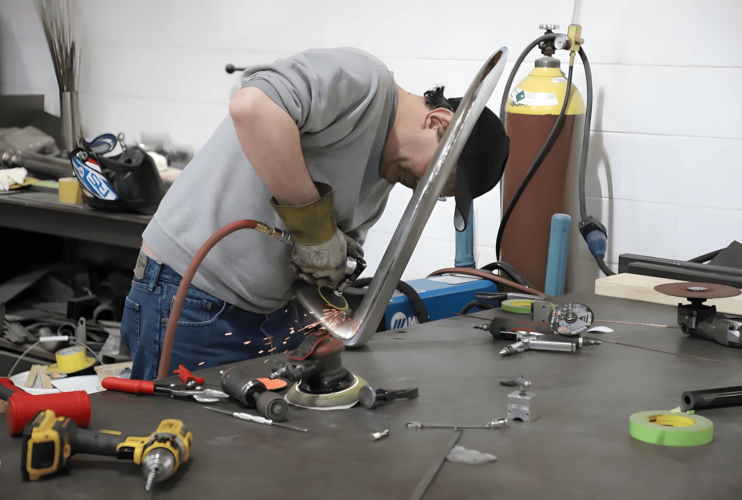 c2 corvette metal shaping process grinding stainless bumper welds fabrication shop sparks
