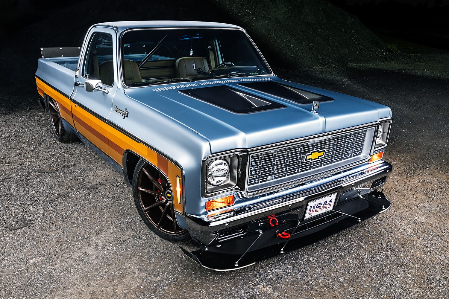 02 1982 Chevrolet C10 custom hood scoop lowered stance pro touring front angle night photography