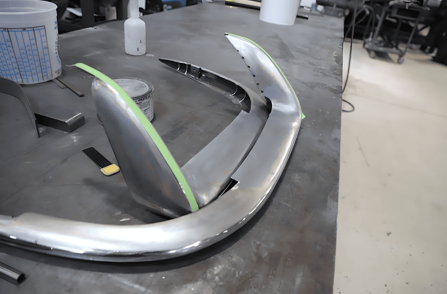 1965 corvette c2 custom rear bumper fabrication stainless steel blade and vertical guards