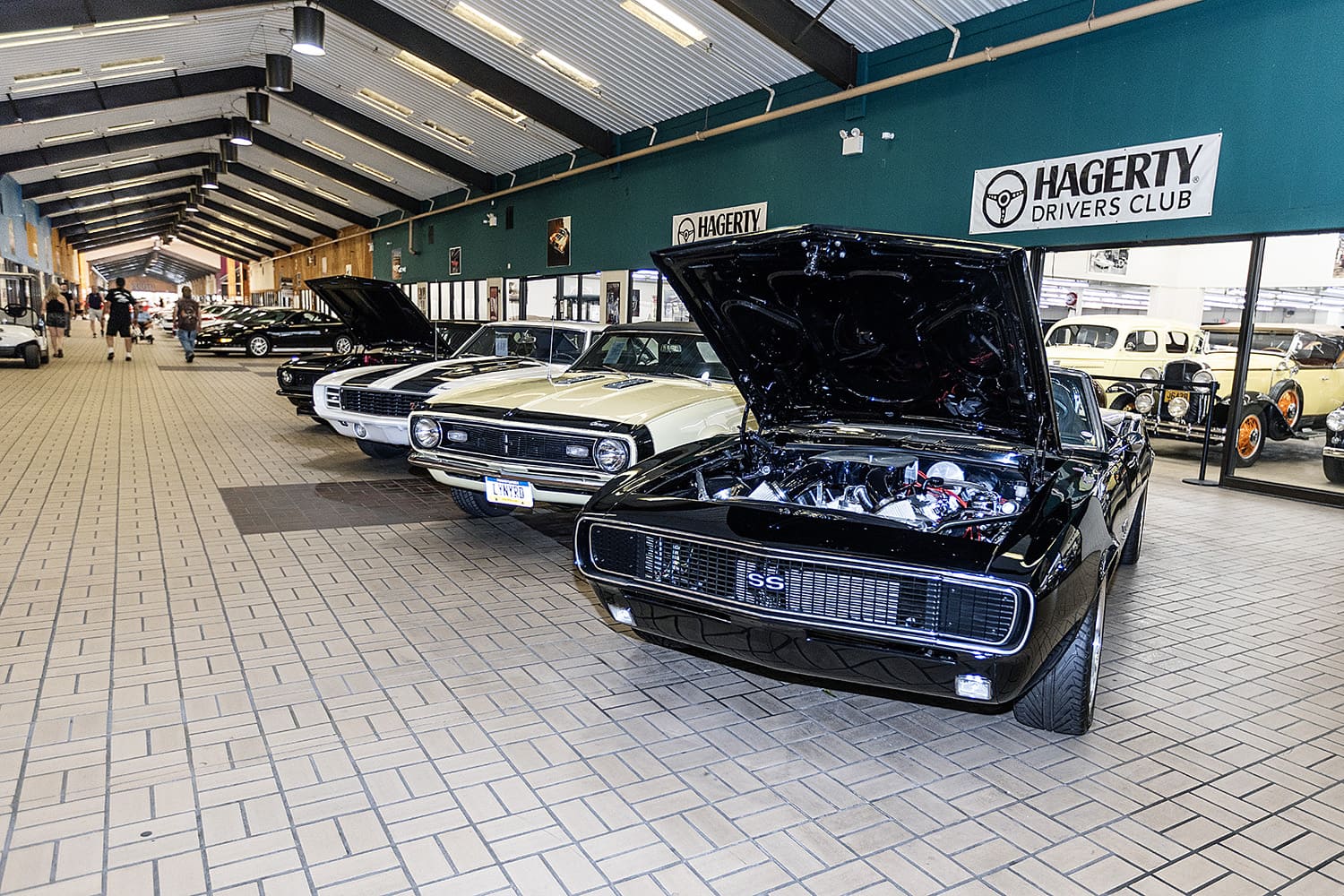 early camaros on display indoors
