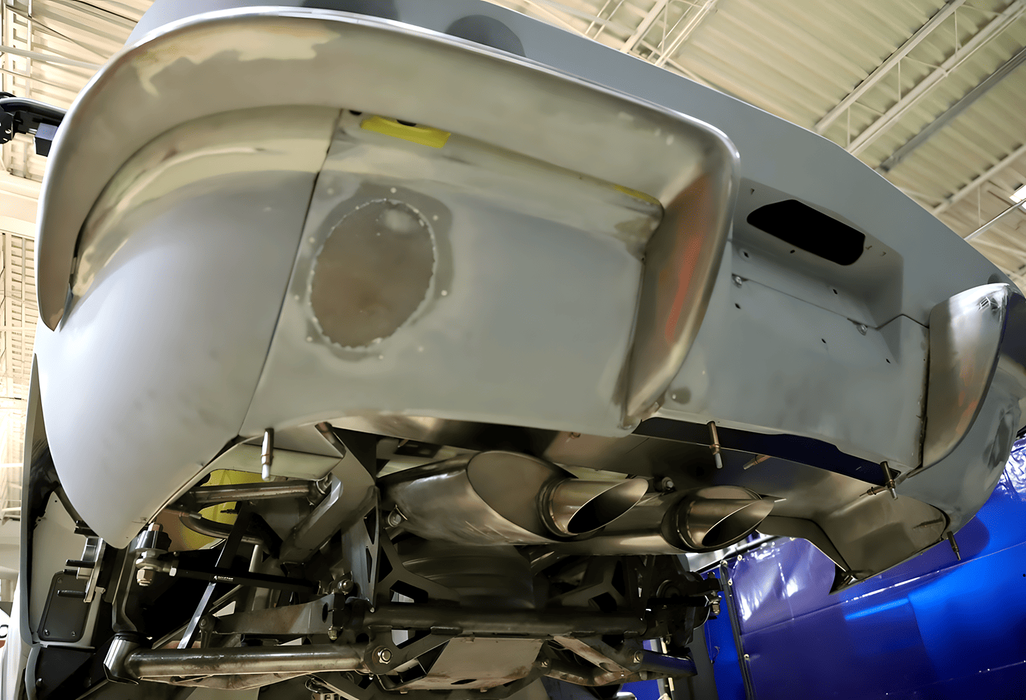1965 Corvette C2 rear underside view dual exhaust tips and custom bumper mounts