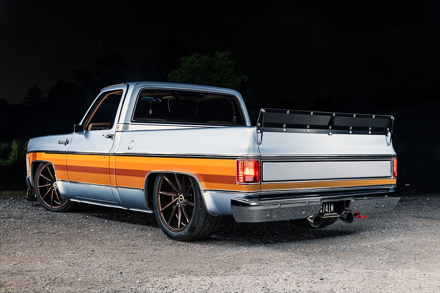 04 1982 Chevrolet C10 rear three quarter view custom bed spoiler lowered stance pro touring build