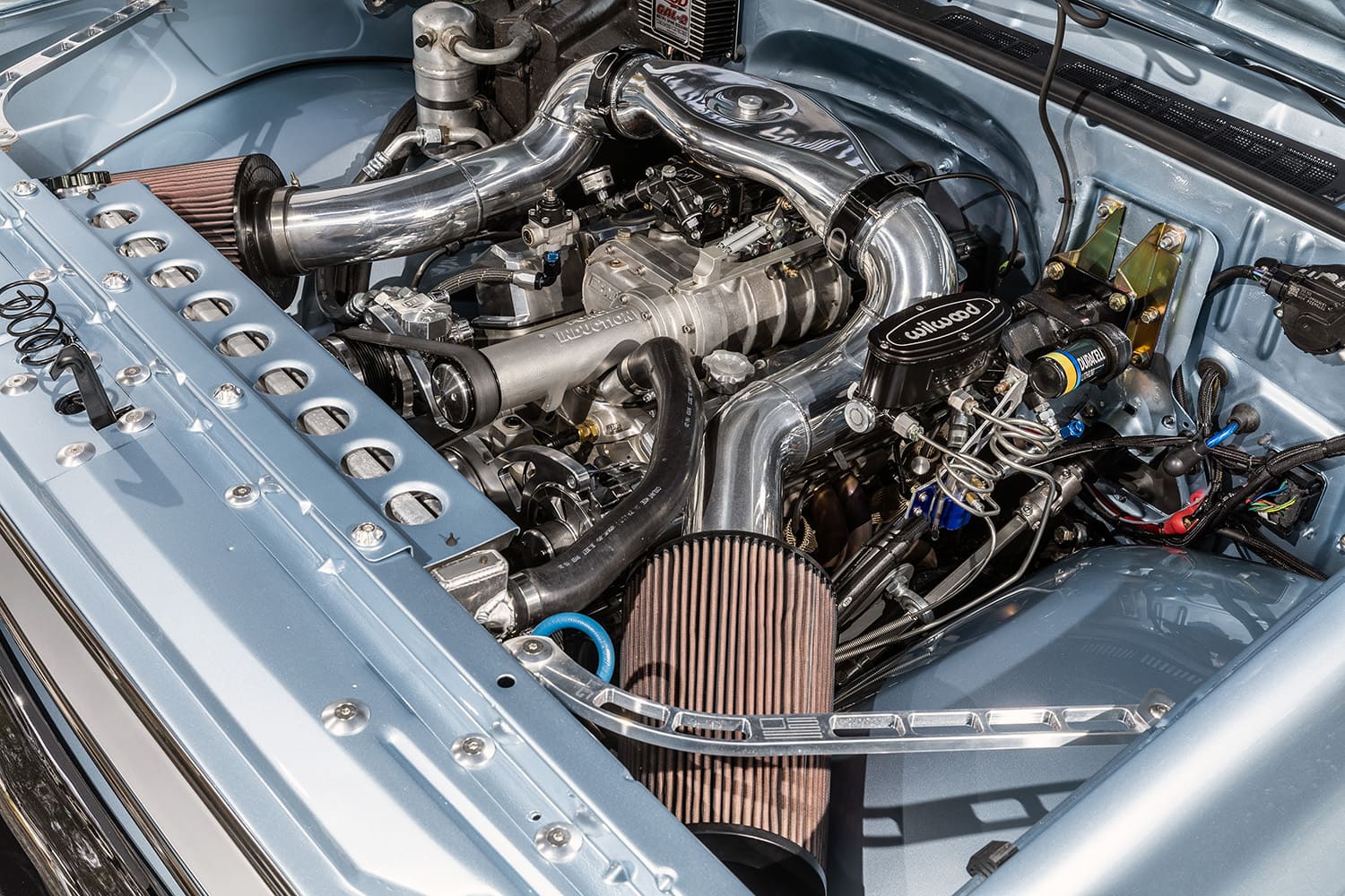 1982 Chevrolet C10 engine bay supercharged V8 polished intake custom performance setup detailed view