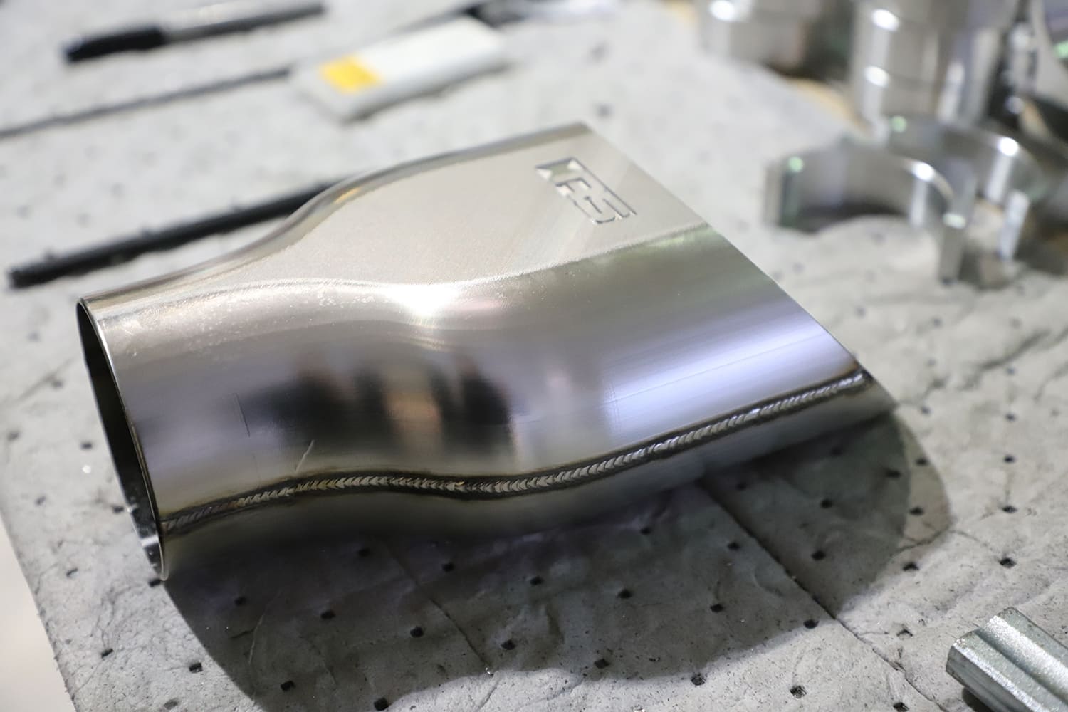 Chevelle Stainless steel exhaust tip halves are welded together.