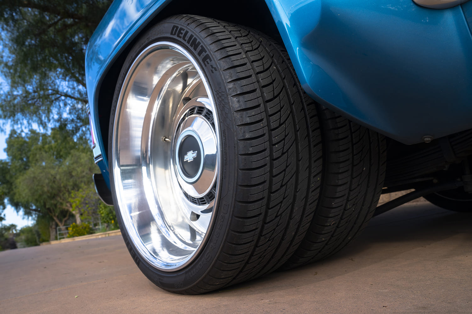 78 dually pickup rear wheels wide stance polished rims detail