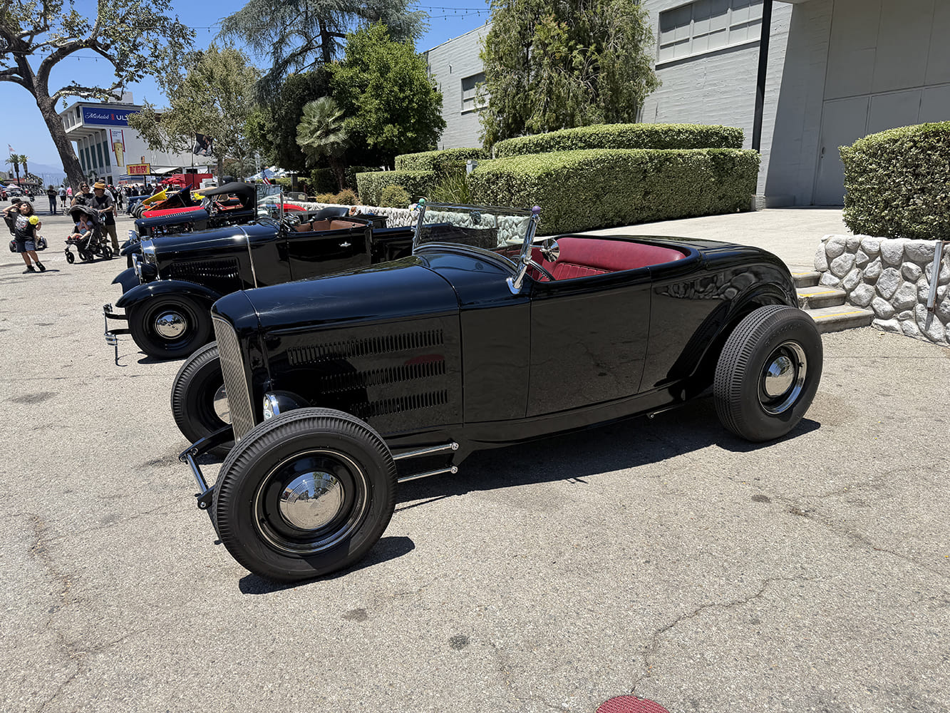 black highboy roadster with red interior at 2026 LA roadster show