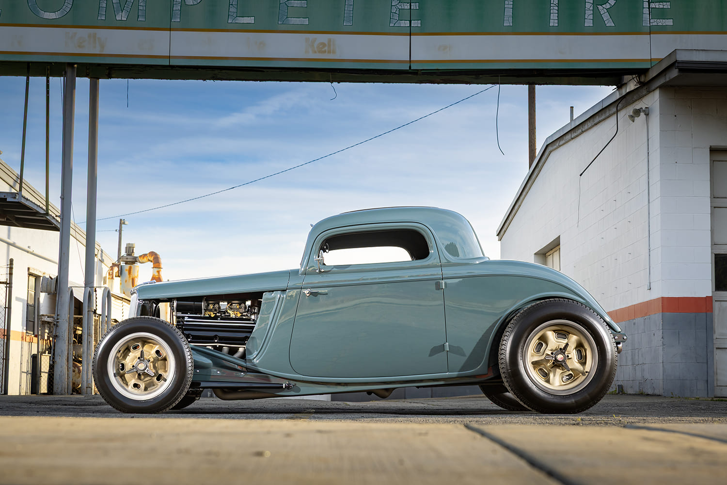 33 Ford Coupe hot rod side profile custom teal paint exposed engine gold wheels