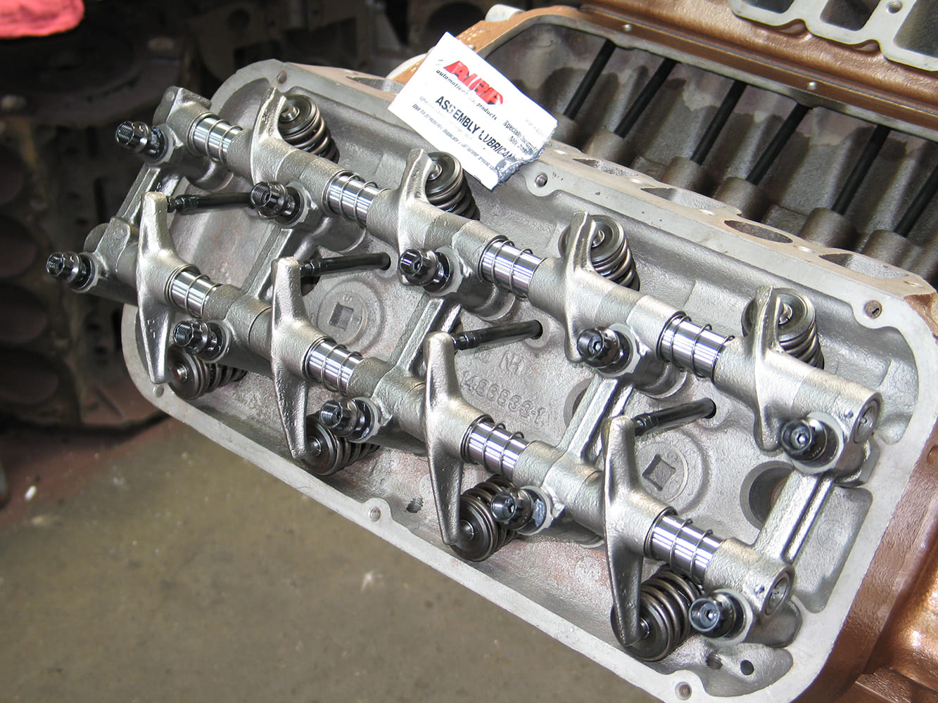 1957 Chrysler 392 Hemi cylinder head valvetrain rocker assembly vintage engine detail