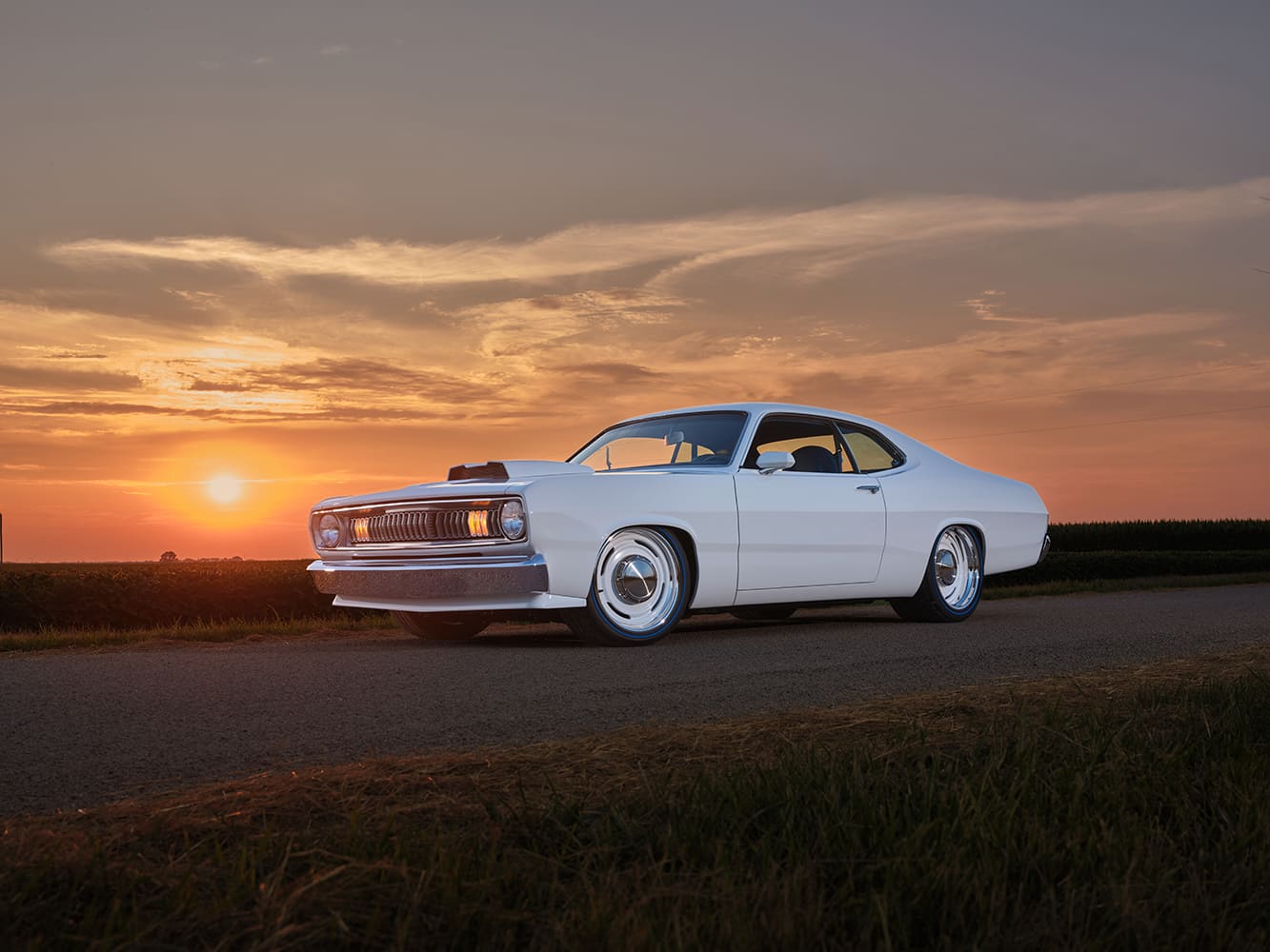 1971 Plymouth Duster front three quarter sunset white custom hood scoop classic muscle car stance
