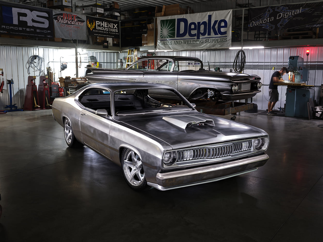 1971 Plymouth Duster fabrication shop build in progress bare metal body custom wheels performance project