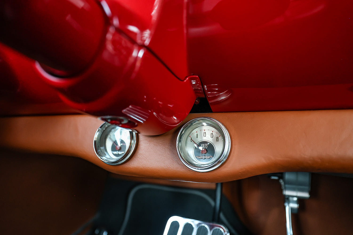 55 Chevy Bel Air custom lower dash detail auxiliary gauges pedals chrome accents classic hot rod interior