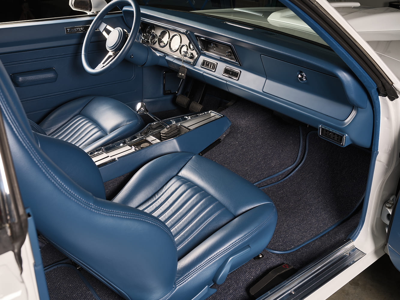1971 Plymouth Duster custom blue interior modernized dash bucket seats console classic muscle car